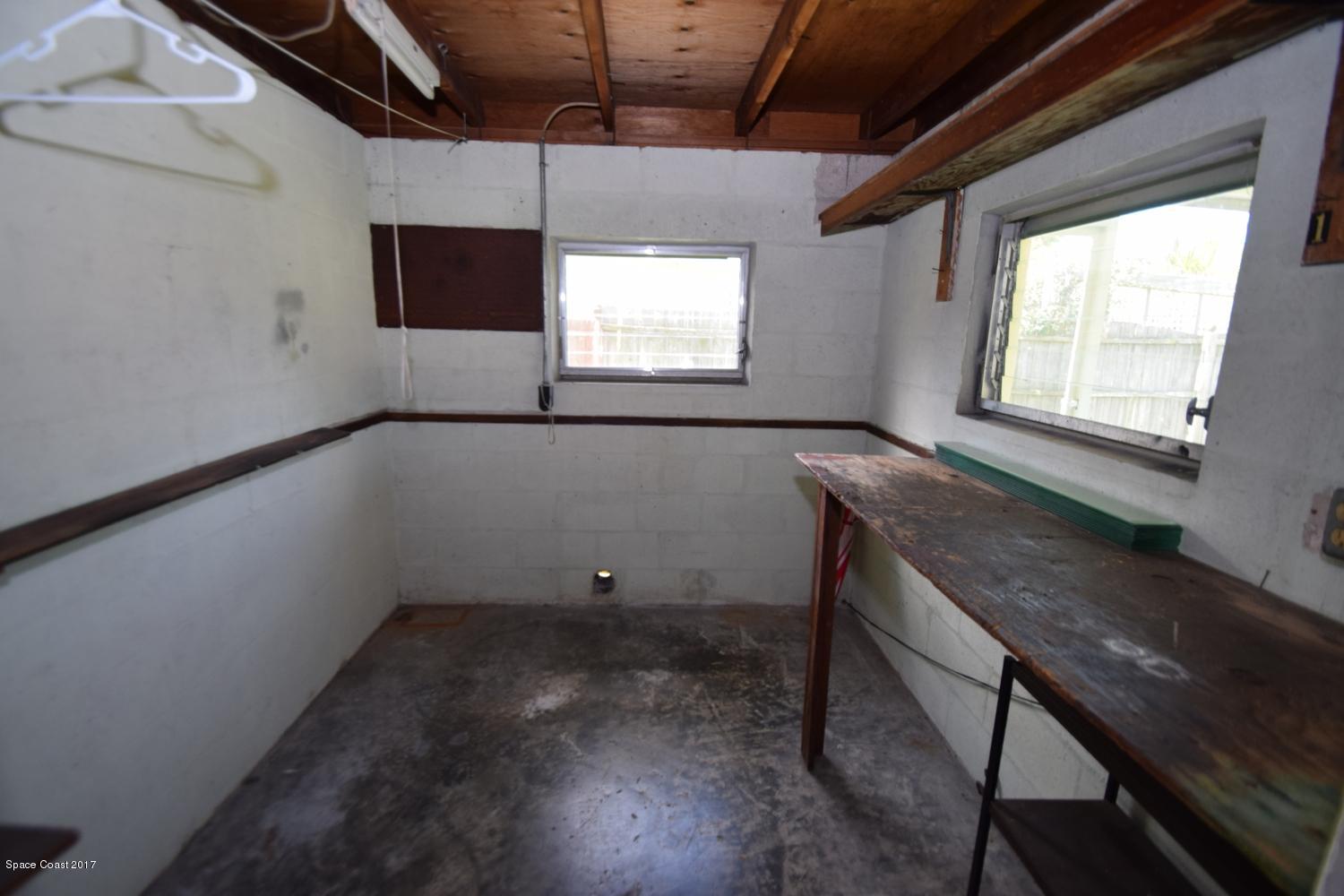 1966 Croton Road Melbourne, FL 32935 - Photo 13 of 15 EXTRA STORAGE/LAUNDRY AREA OFF GARAGE