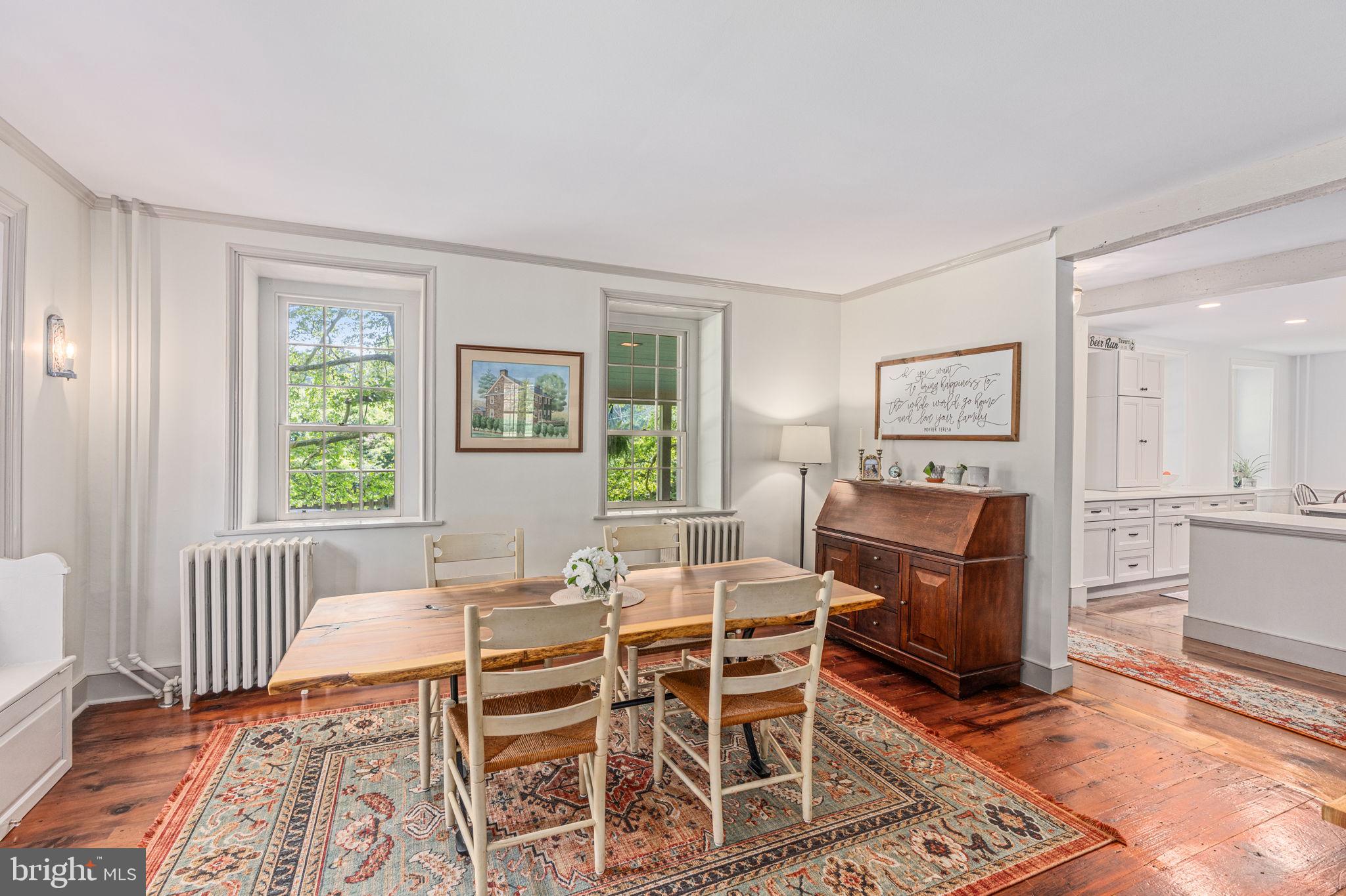 137 Callowhill Road Chalfont, PA 18914 - Photo 15 of 59 a dining room with wooden floor and furniture