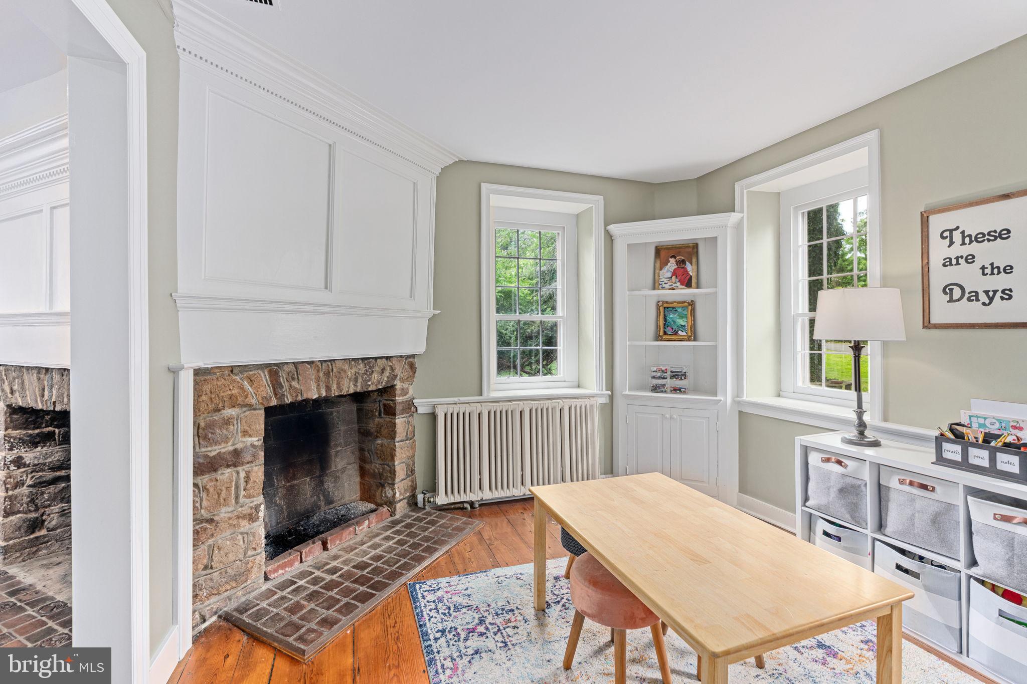 137 Callowhill Road Chalfont, PA 18914 - Photo 24 of 59 a living room with furniture a fireplace and a window