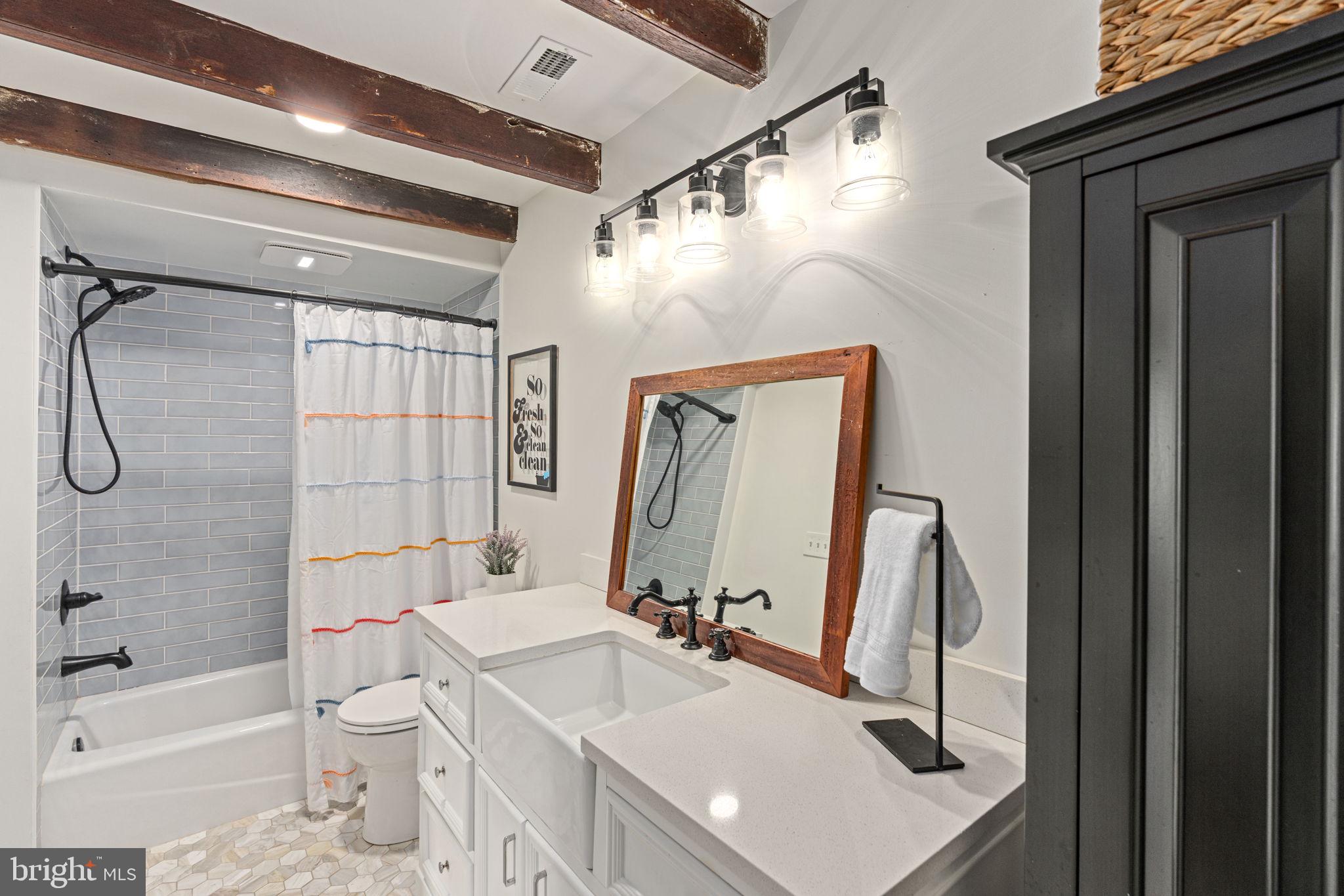 137 Callowhill Road Chalfont, PA 18914 - Photo 35 of 59 a bathroom with a sink vanity granite tub and shower