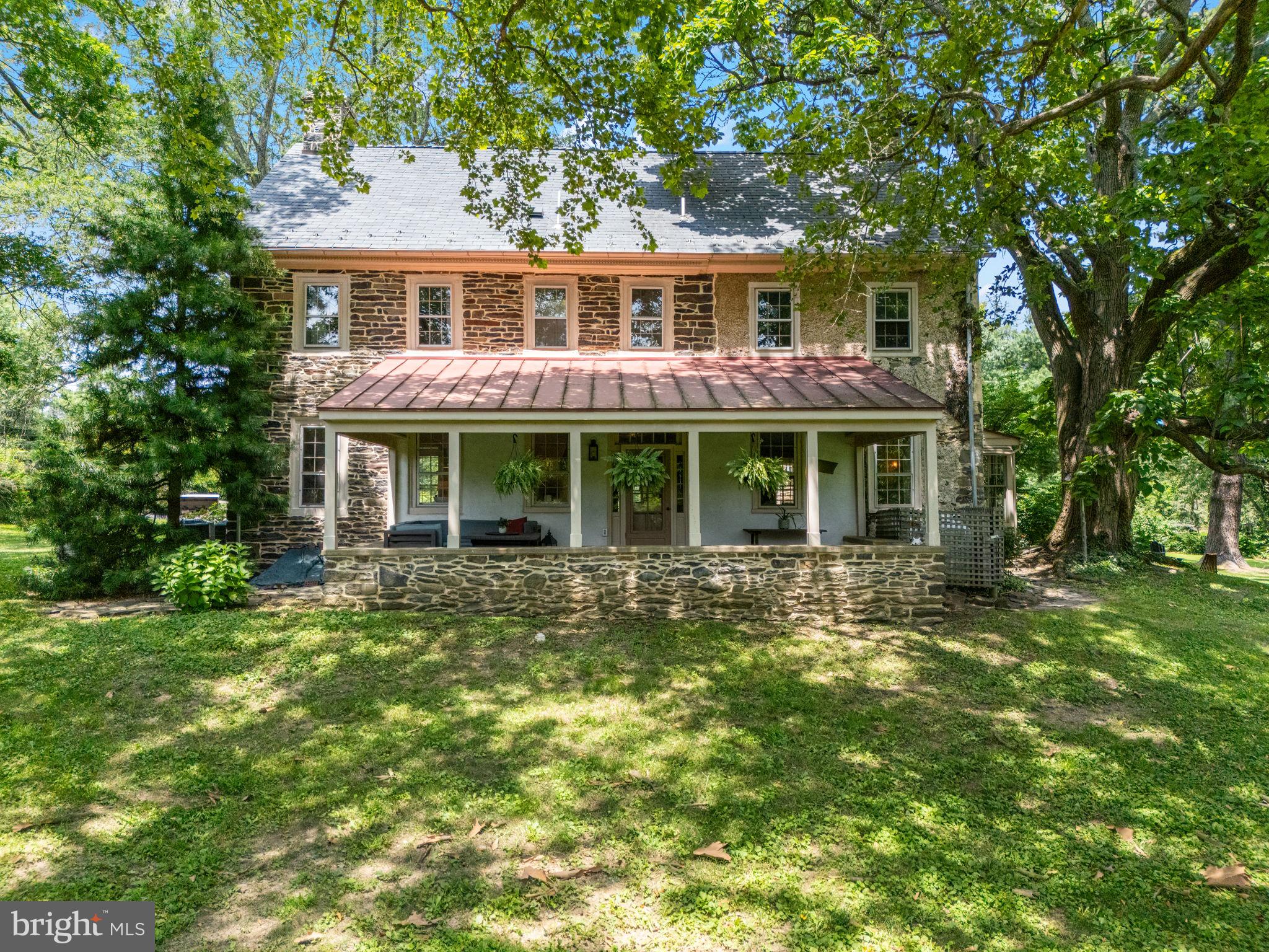 137 Callowhill Road Chalfont, PA 18914 - Photo 36 of 59 a front view of a house with a garden