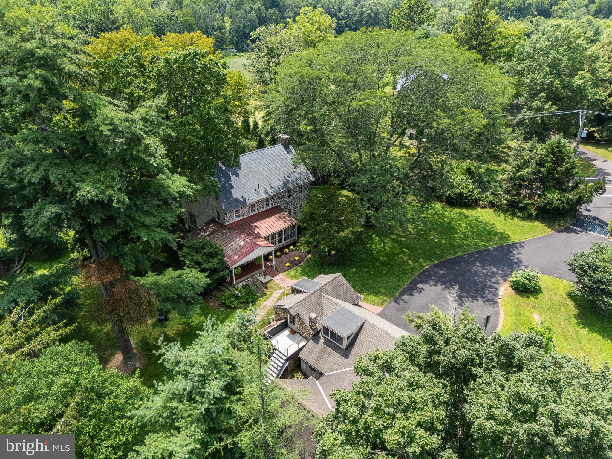 137 Callowhill Road Chalfont, PA 18914 - Photo 4 of 59 an aerial view of a house with yard and outdoor seating