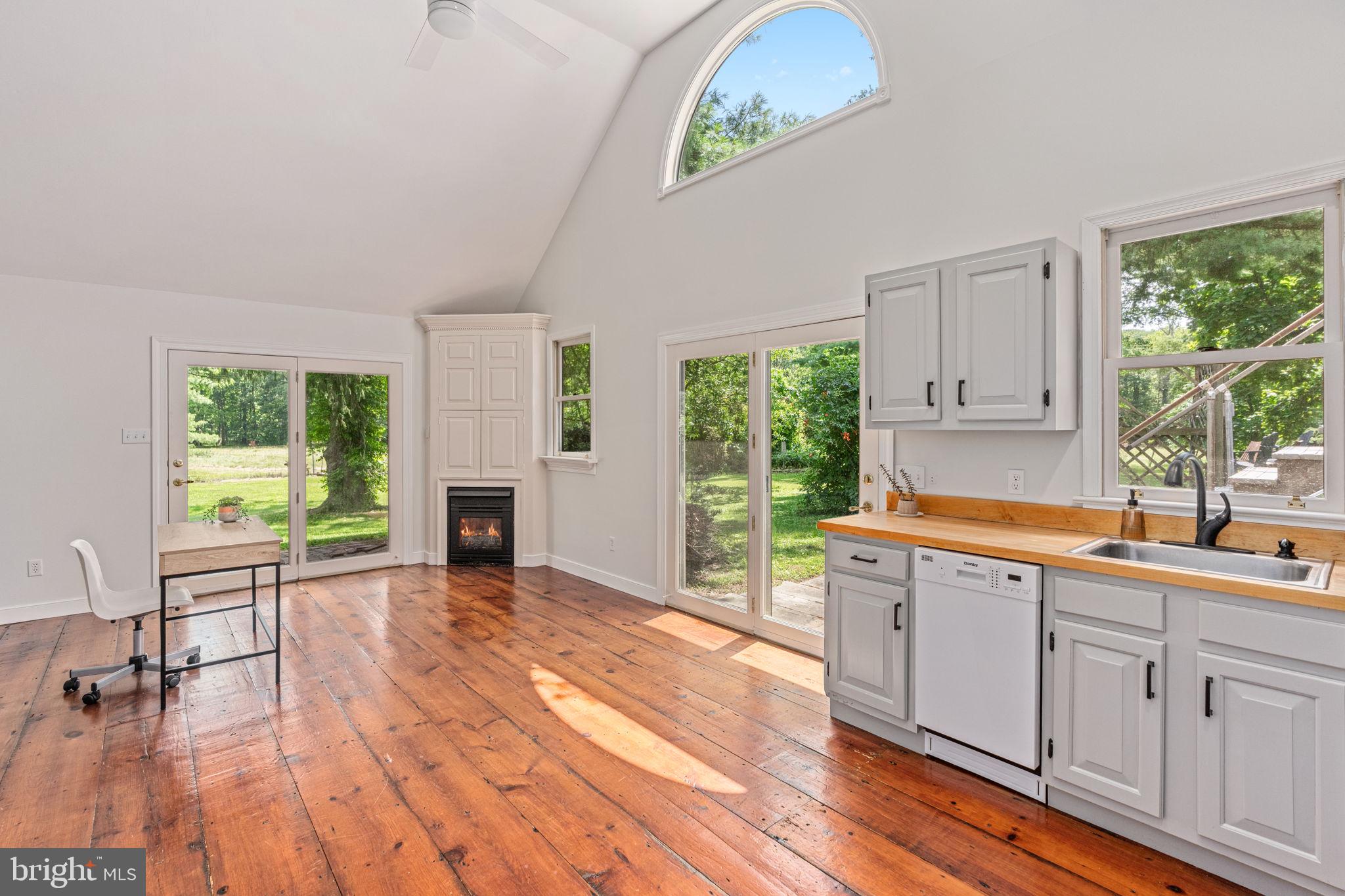 137 Callowhill Road Chalfont, PA 18914 - Photo 44 of 59 a view of a kitchen with furniture window and wooden floor
