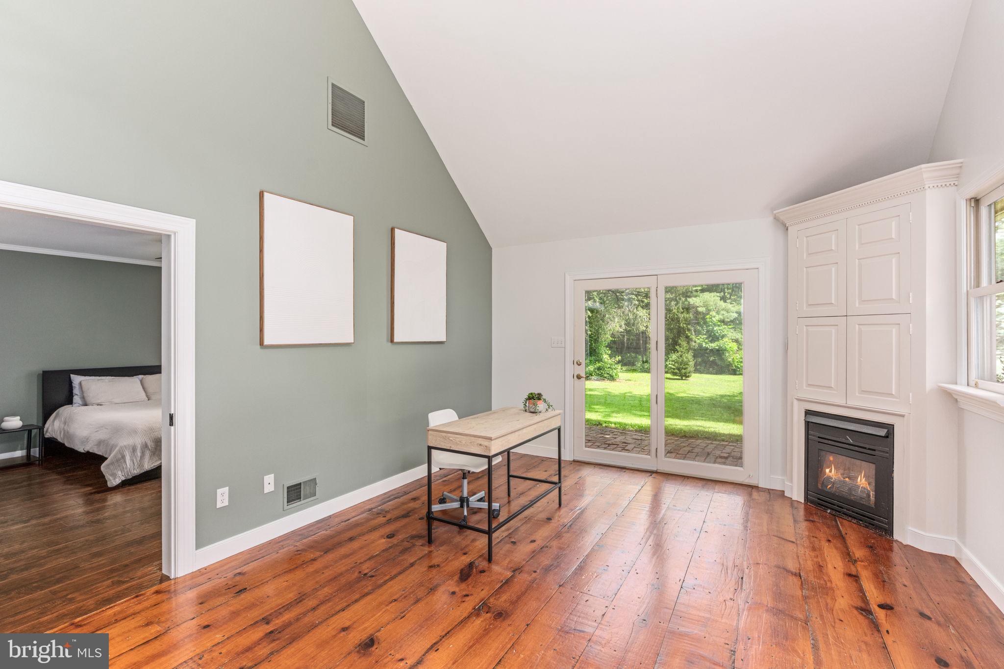 137 Callowhill Road Chalfont, PA 18914 - Photo 47 of 59 a living room with furniture and a wooden floor