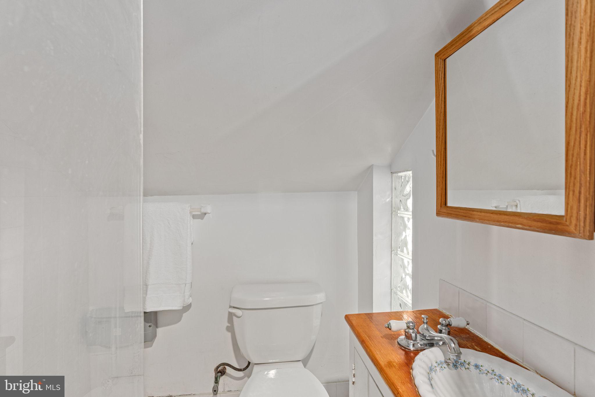 137 Callowhill Road Chalfont, PA 18914 - Photo 56 of 59 a bathroom with a sink and a mirror