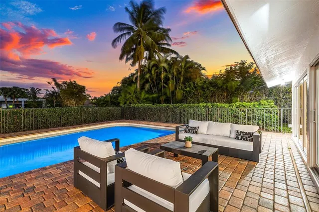 a view of a garden with a lake view