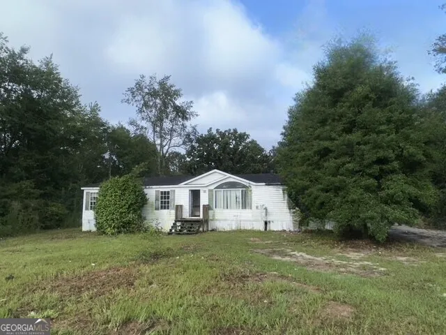 a house view with a garden space