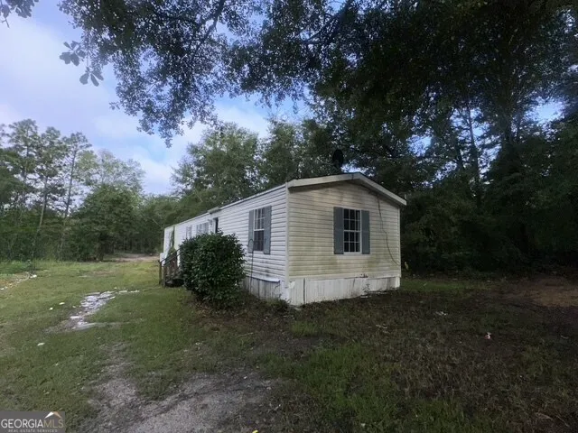 a backyard of house with green space