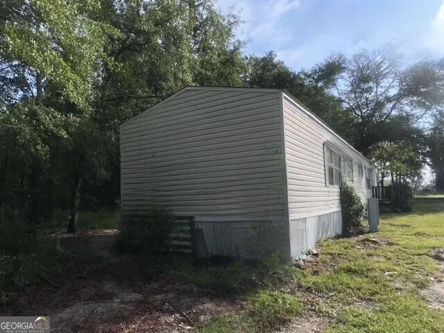 a view of backyard of house