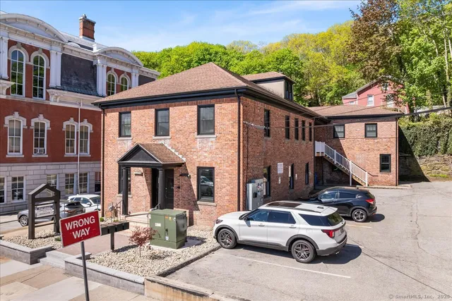 a car parked in front of a house