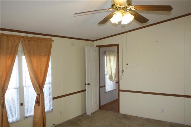 4372 Elkwood Section Road Ardmore, AL 35739 - Photo 11 of 20 a view of a livingroom with a ceiling fan and window