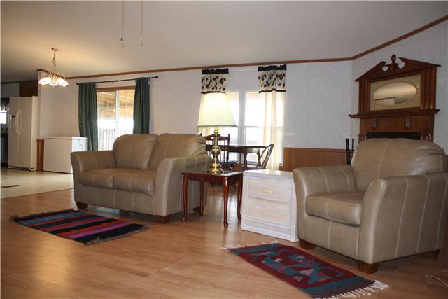 4372 Elkwood Section Road Ardmore, AL 35739 - Photo 4 of 20 a living room with furniture and a flat screen tv