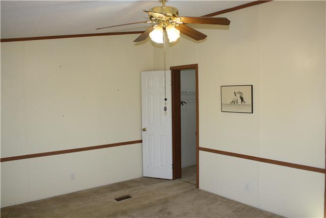 4372 Elkwood Section Road Ardmore, AL 35739 - Photo 10 of 20 a view of a chandelier fan in a room