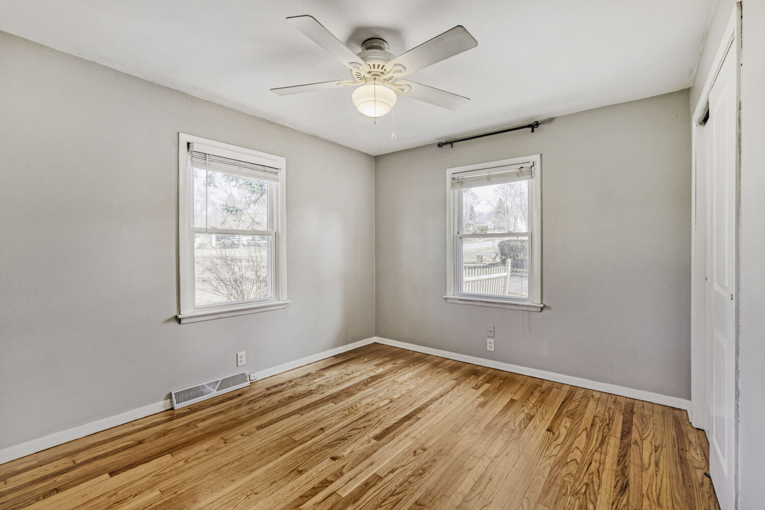 3 Sunset Lane Algonquin, IL 60102 - Photo 14 of 23 a view of an empty room with window and a chandelier fan