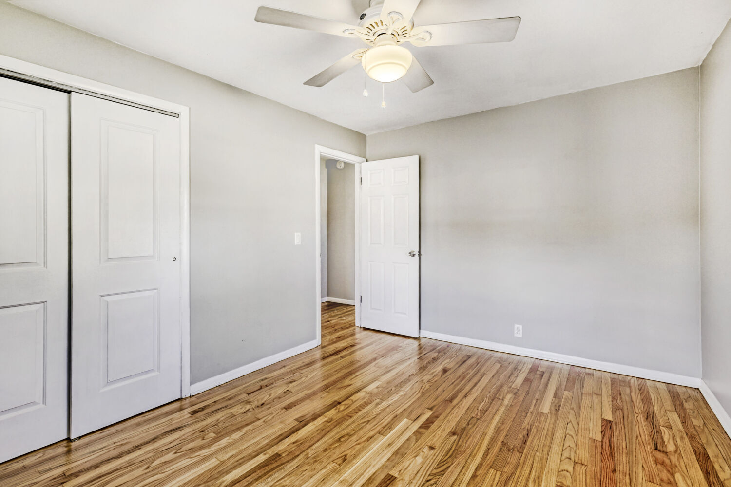 3 Sunset Lane Algonquin, IL 60102 - Photo 15 of 23 an empty room with wooden floor fan and windows
