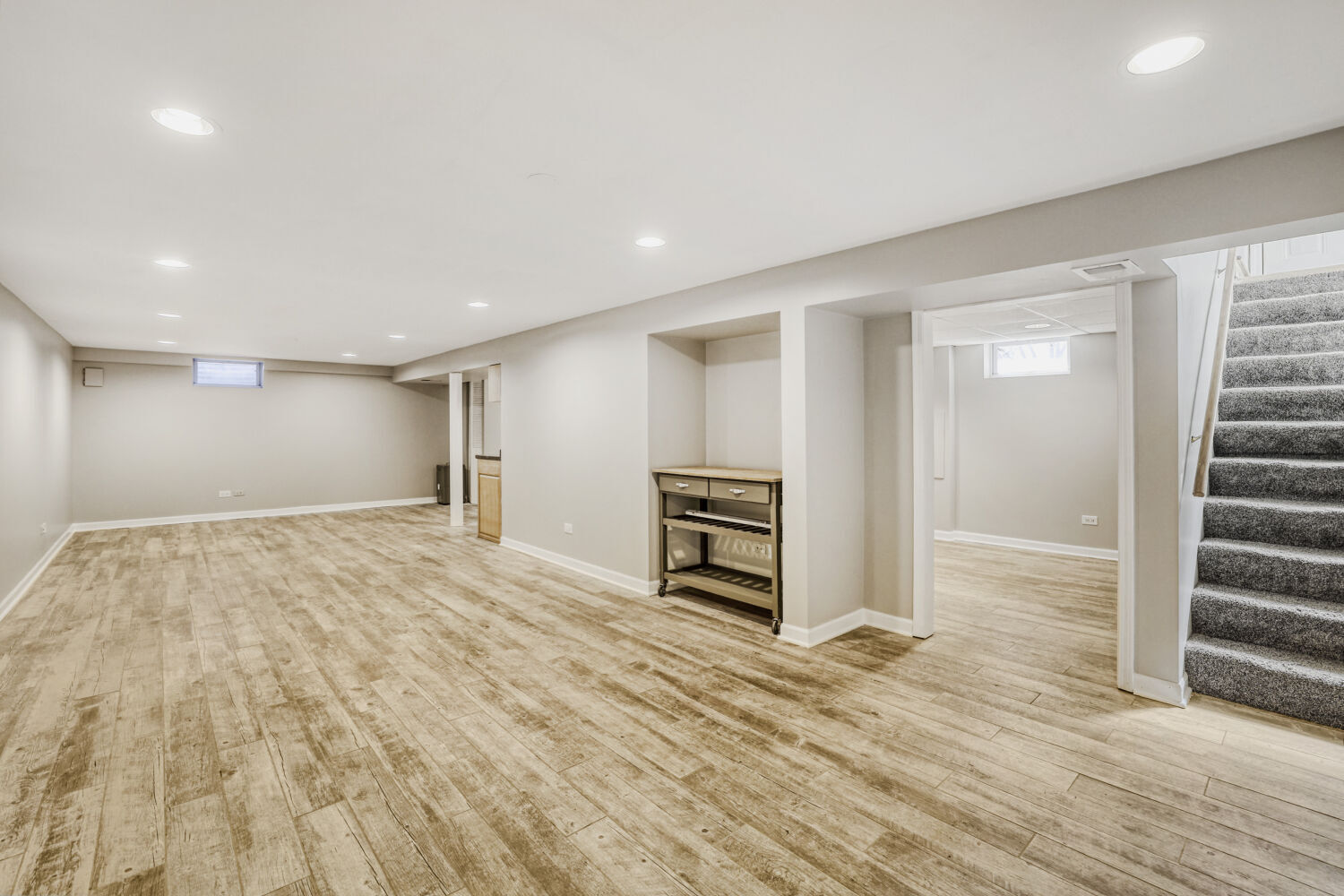 3 Sunset Lane Algonquin, IL 60102 - Photo 18 of 23 a view of a livingroom with wooden floor and stairs