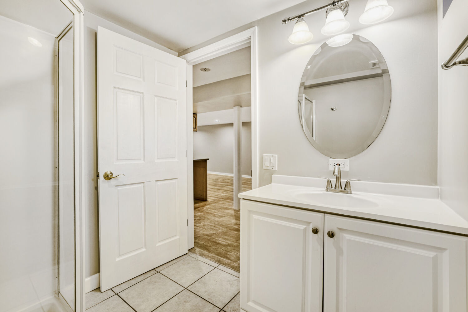 3 Sunset Lane Algonquin, IL 60102 - Photo 21 of 23 a bathroom with a sink a mirror and a shower