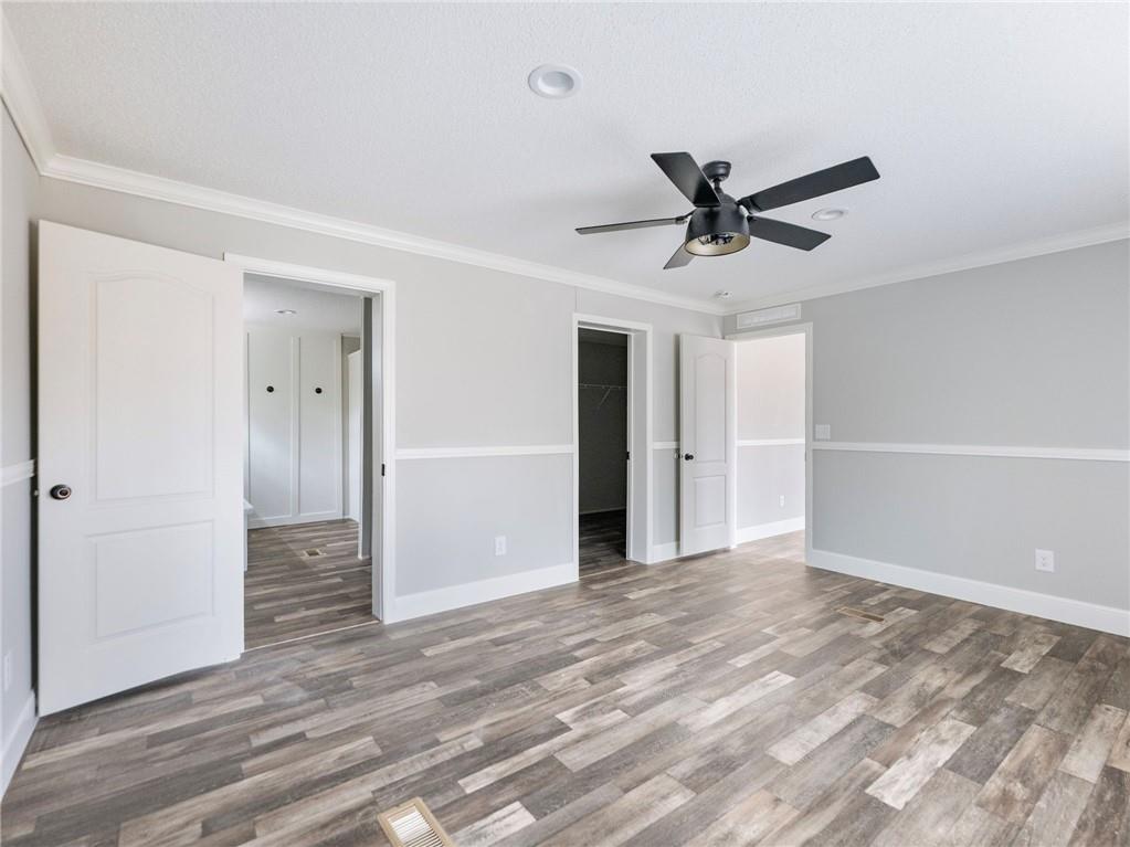 5230 Bogus Road Commerce, GA 30530 - Photo 13 of 45 a view of a livingroom with a ceiling fan and window