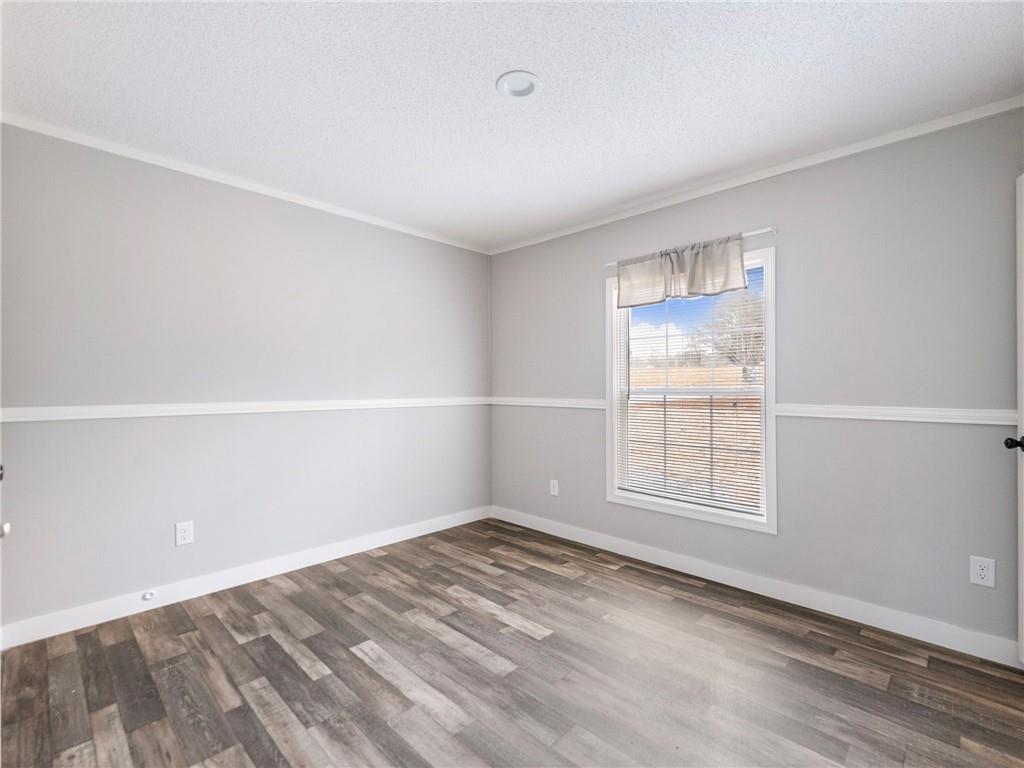 5230 Bogus Road Commerce, GA 30530 - Photo 24 of 45 an empty room with windows