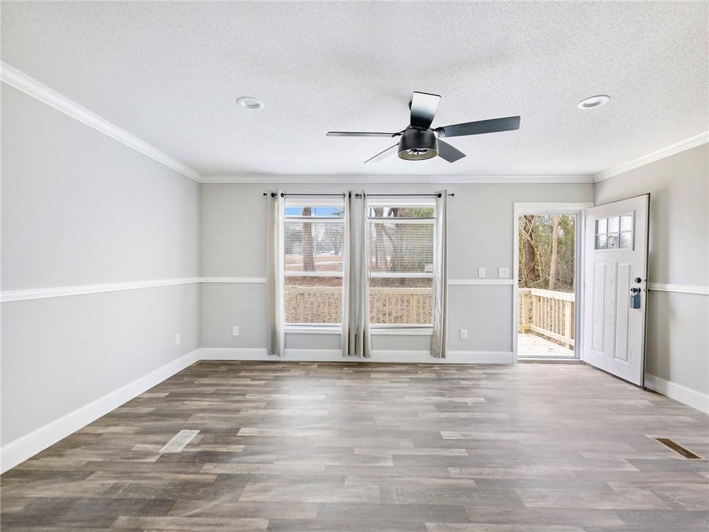 5230 Bogus Road Commerce, GA 30530 - Photo 3 of 45 a view of an empty room with a window