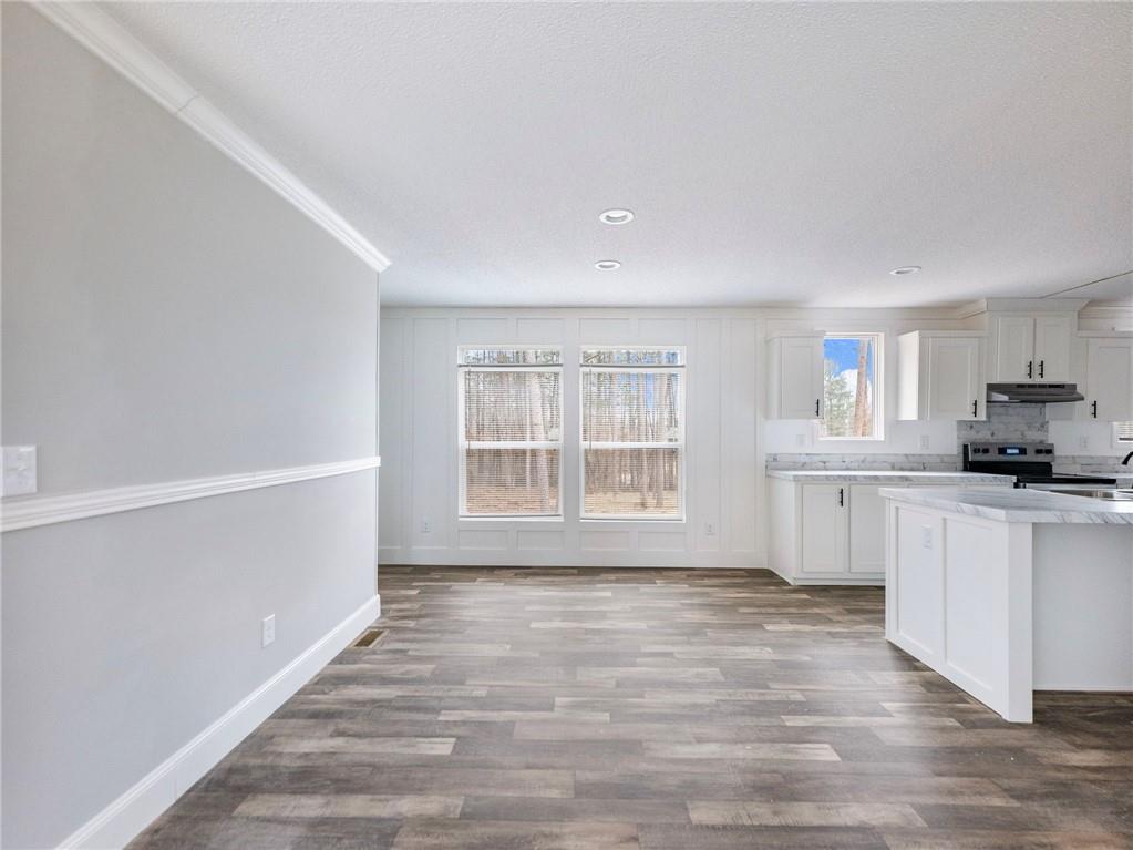 5230 Bogus Road Commerce, GA 30530 - Photo 5 of 45 a view of a kitchen with electric appliances