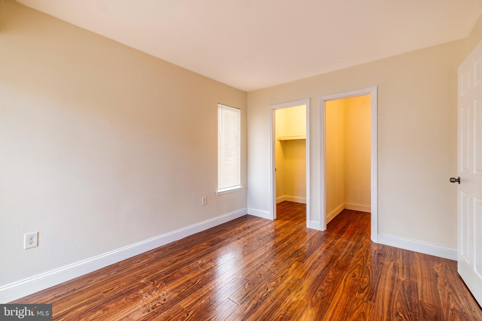 1209 Timber Creek Road Clementon, NJ 08021 - Photo 11 of 23 a view of room with window and wooden floor