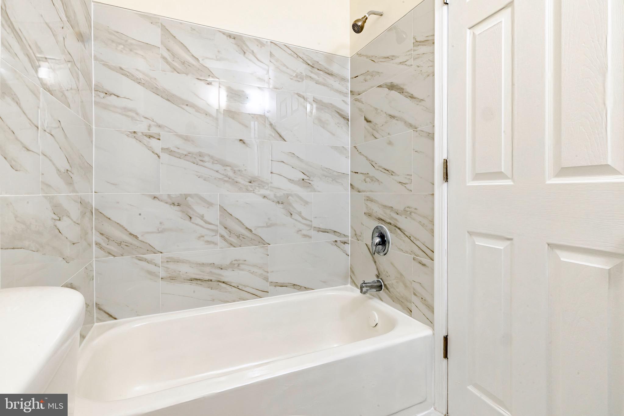1209 Timber Creek Road Clementon, NJ 08021 - Photo 12 of 23 a bathroom with a bathtub and shower