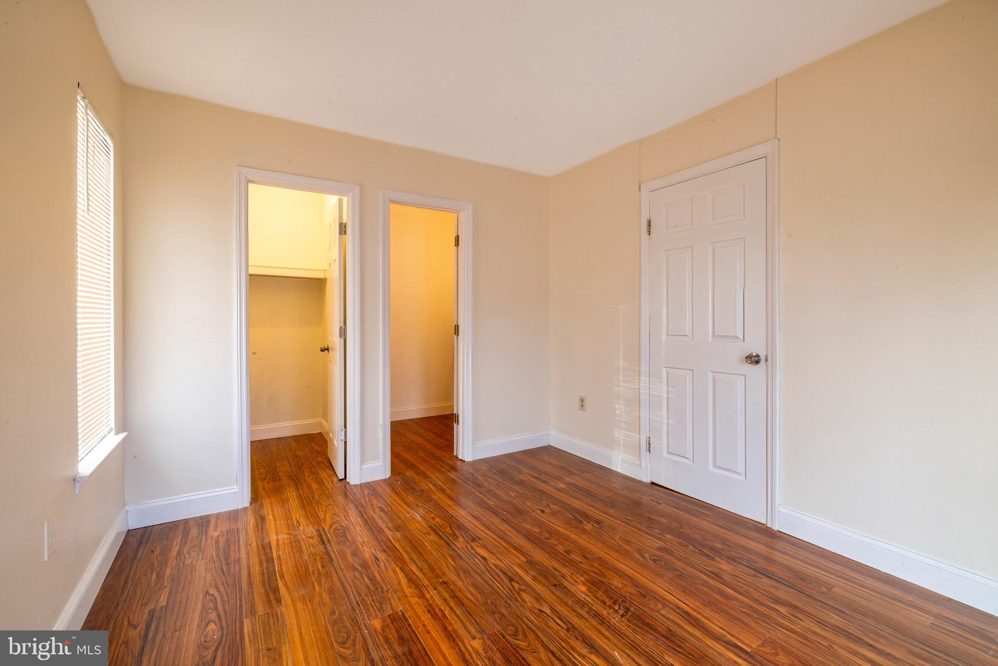 1209 Timber Creek Road Clementon, NJ 08021 - Photo 20 of 23 a view of empty room with wooden floor and fan