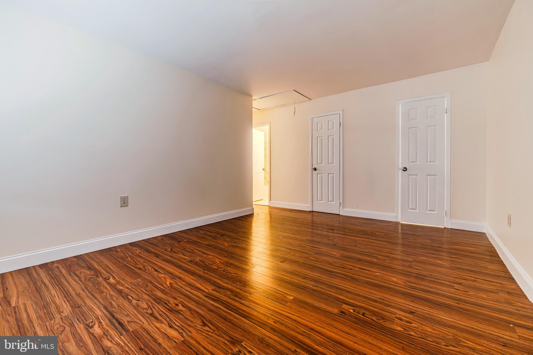 1209 Timber Creek Road Clementon, NJ 08021 - Photo 23 of 23 a view of wooden floor and brick walls
