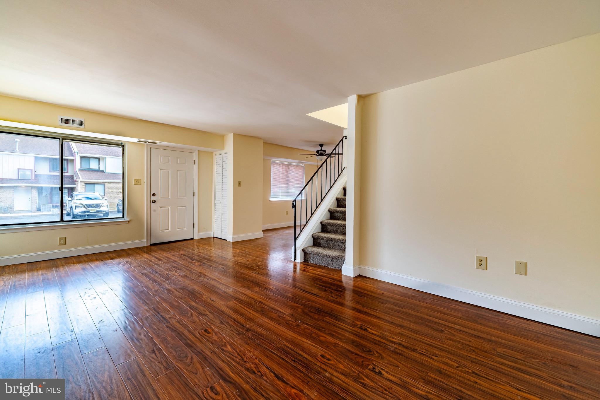 1209 Timber Creek Road Clementon, NJ 08021 - Photo 5 of 23 wooden floor in an empty room with a window