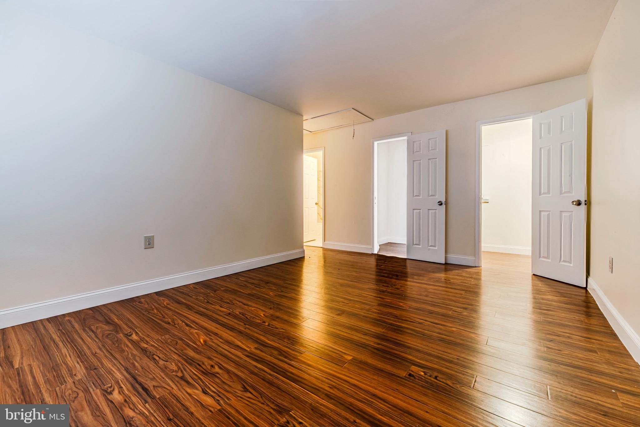 1209 Timber Creek Road Clementon, NJ 08021 - Photo 10 of 23 a view of wooden floor and windows in a room