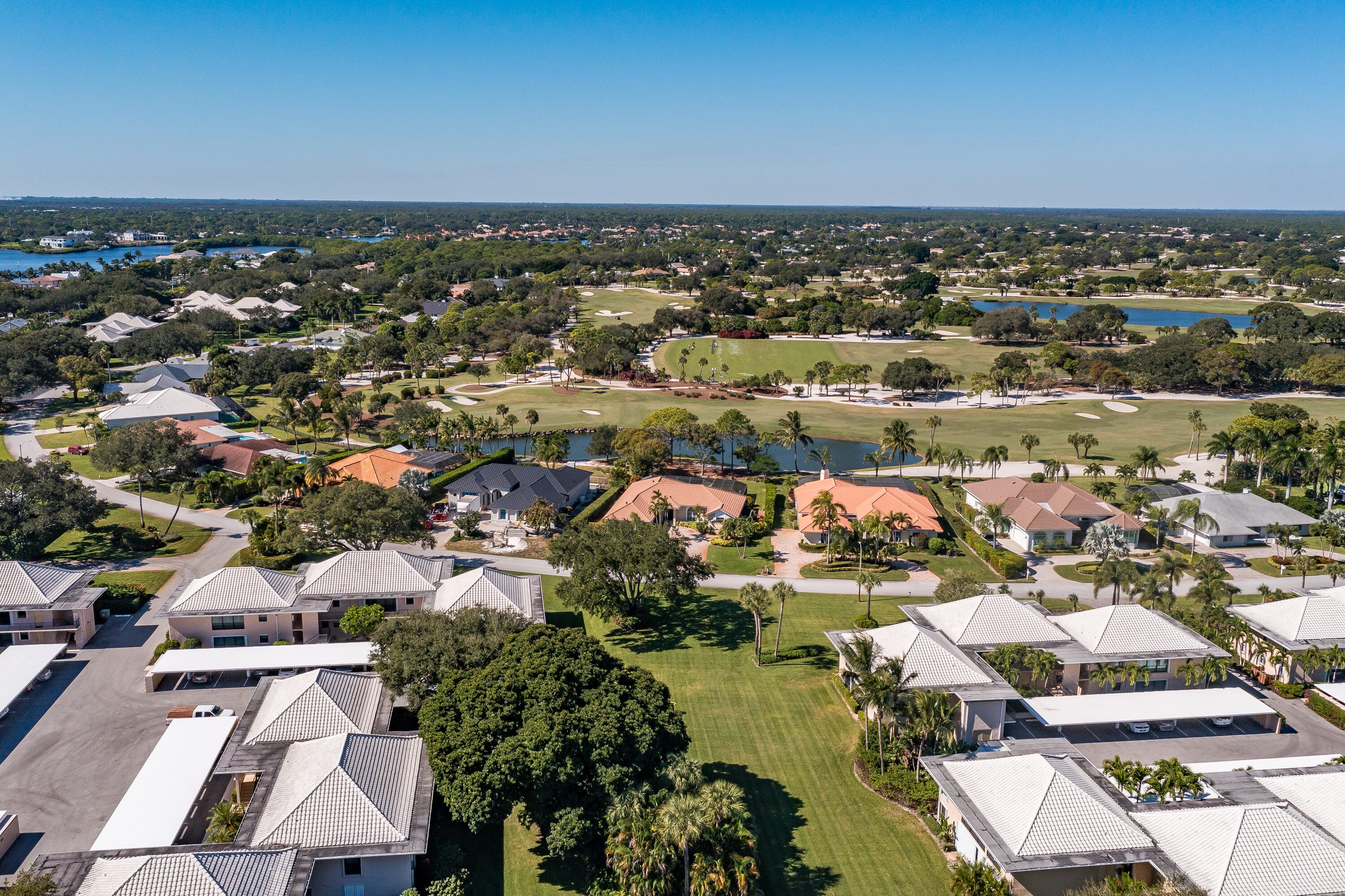 6 Concourse Drive, Unit A Jupiter, FL 33469 - Photo 45 of 49 an aerial view of residential houses with outdoor space