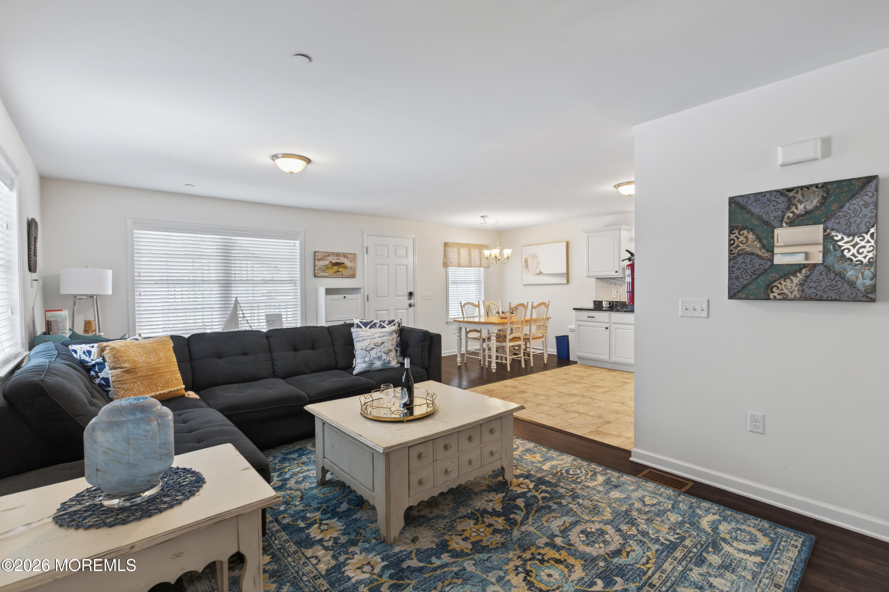 2033 Highway 35, Unit 3 Seaside Heights, NJ 08751 - Photo 19 of 45 a living room with furniture and a table