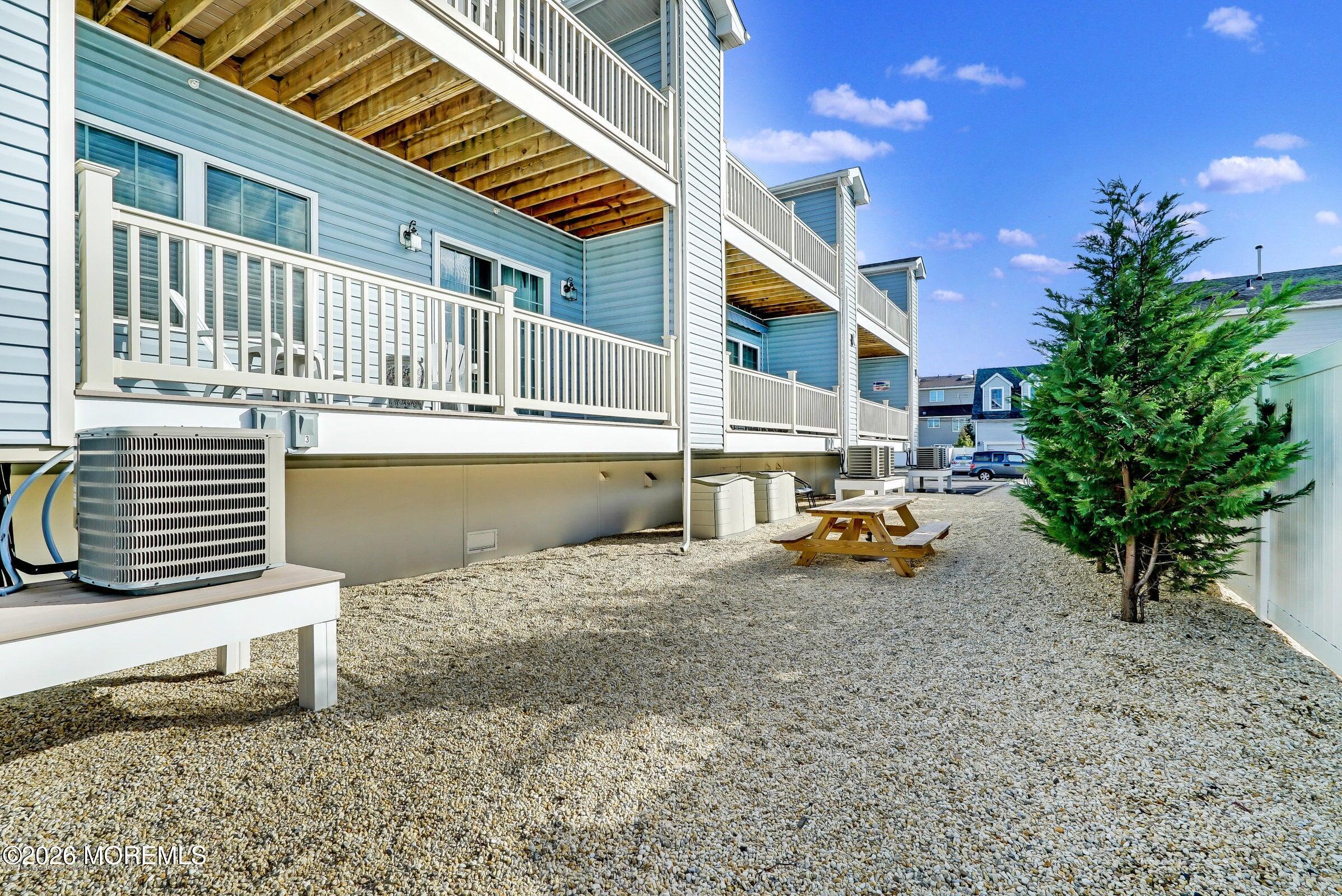 2033 Highway 35, Unit 3 Seaside Heights, NJ 08751 - Photo 26 of 45 a view of a house with backyard and sitting area