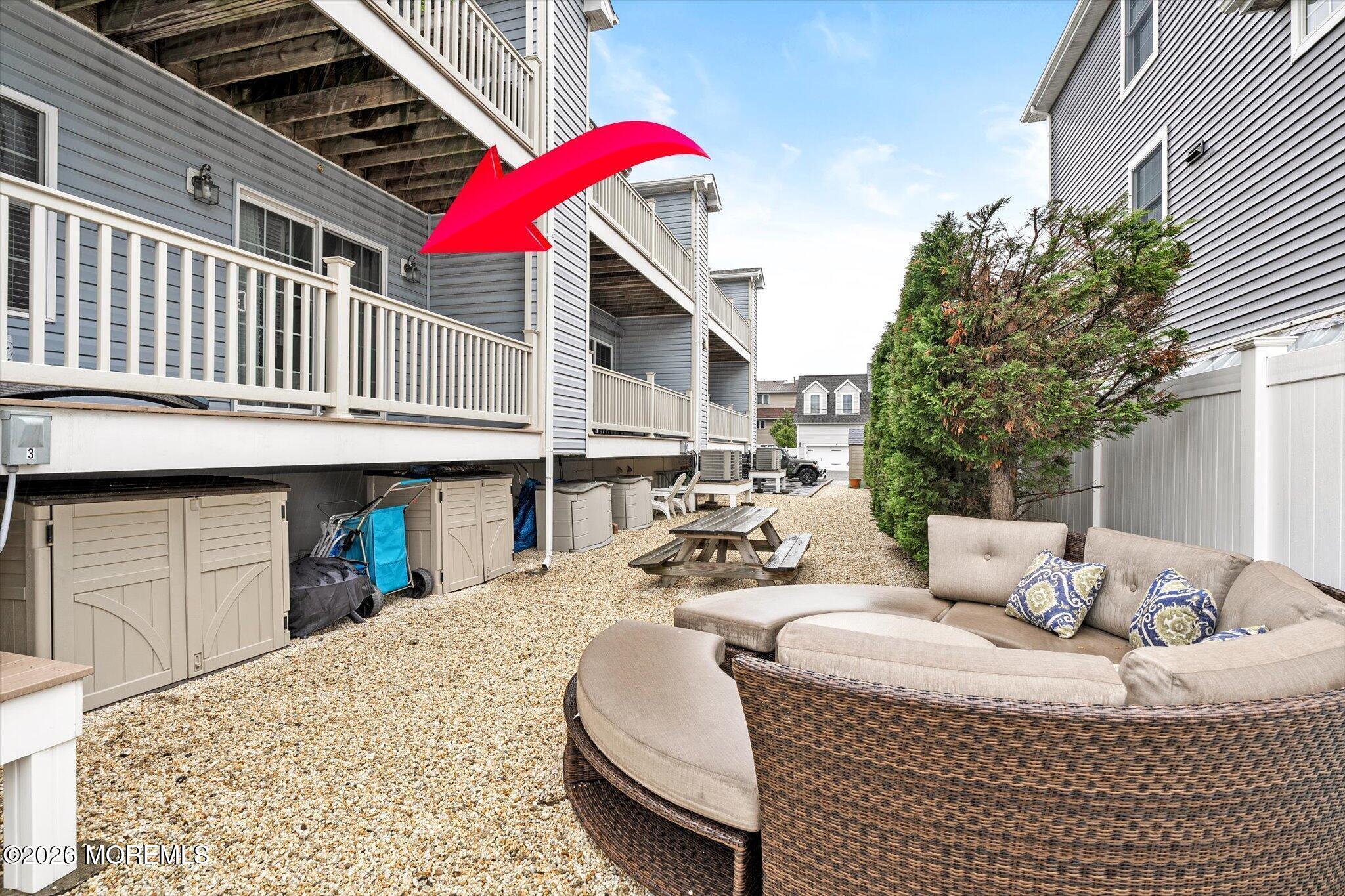 2033 Highway 35, Unit 3 Seaside Heights, NJ 08751 - Photo 28 of 45 a view of a patio with couches table and chairs and potted plants
