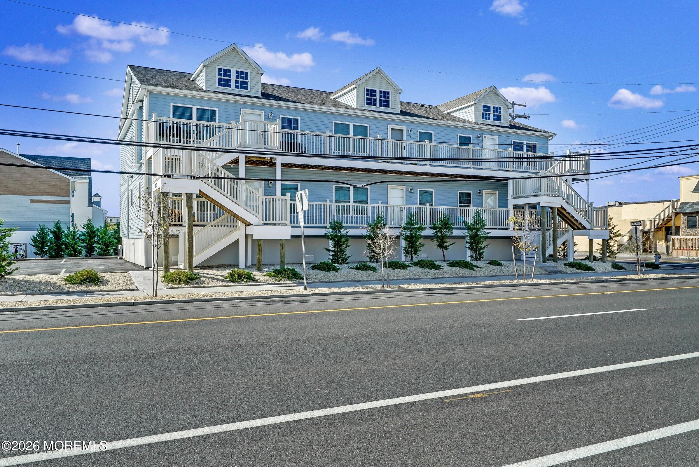 2033 Highway 35, Unit 3 Seaside Heights, NJ 08751 - Photo 29 of 45 a view of a building with a terrace