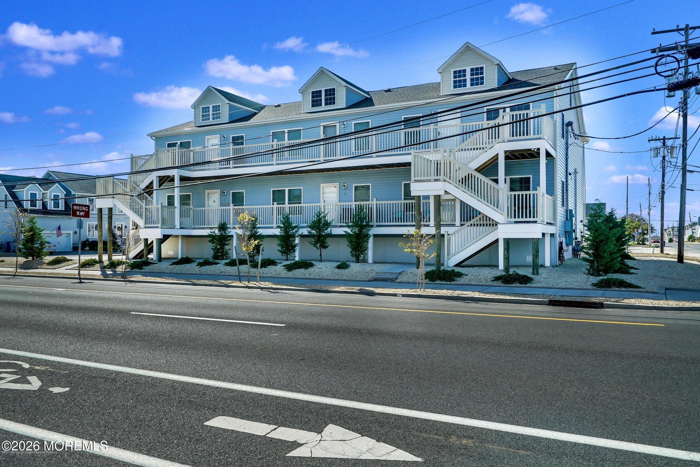 2033 Highway 35, Unit 3 Seaside Heights, NJ 08751 - Photo 30 of 45 a view of a building with a street