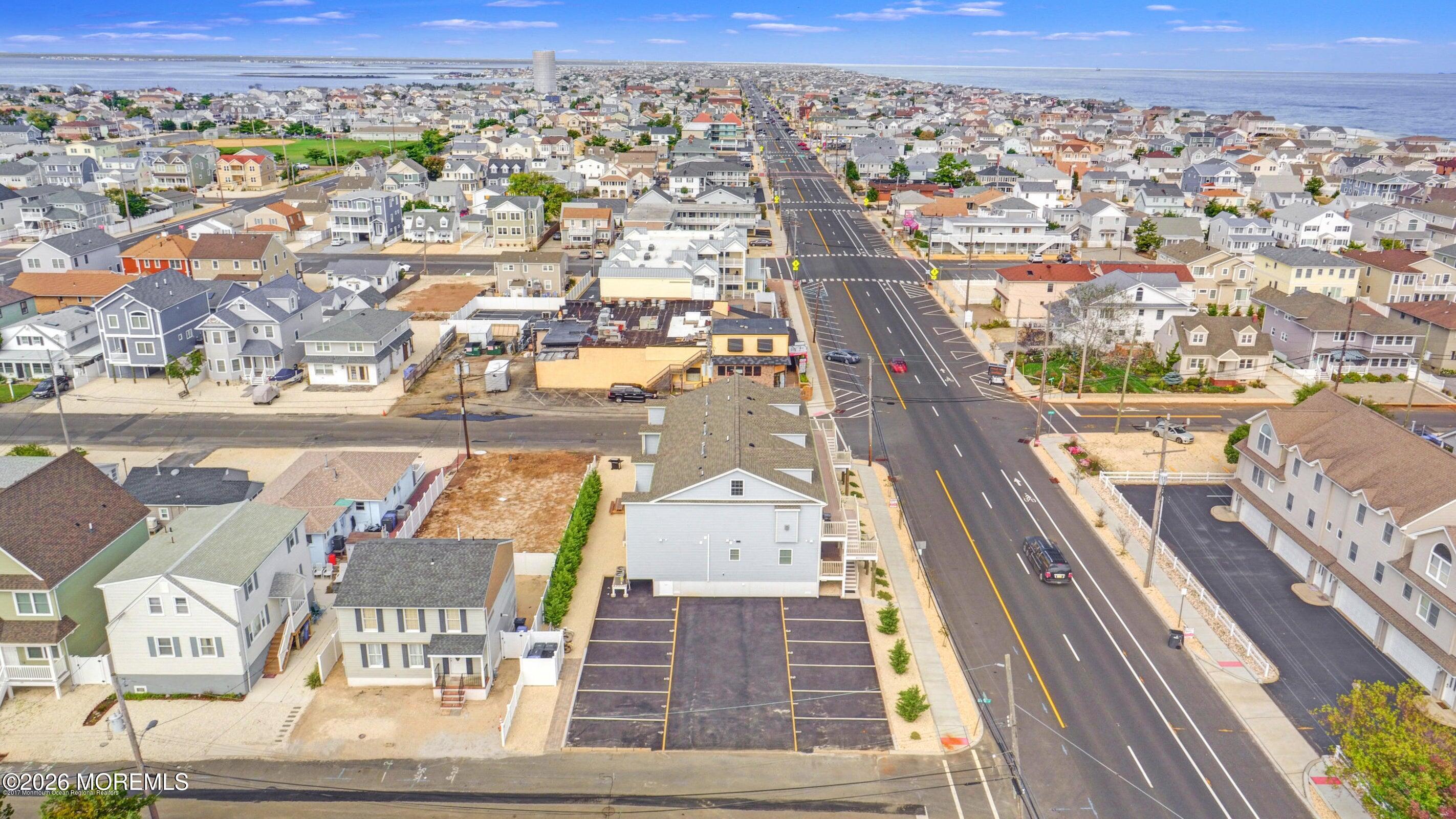 2033 Highway 35, Unit 3 Seaside Heights, NJ 08751 - Photo 39 of 45 an aerial view of a residential apartment building with a city view