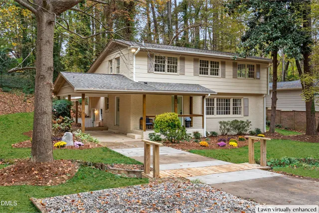 front view of a house with a yard