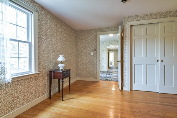 33 R Cedar Street Wellesley, MA 02481 - Photo 12 of 21 a view of empty room with wooden floor and fan