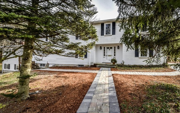 33 R Cedar Street Wellesley, MA 02481 - Photo 2 of 21 a front view of a house with a yard