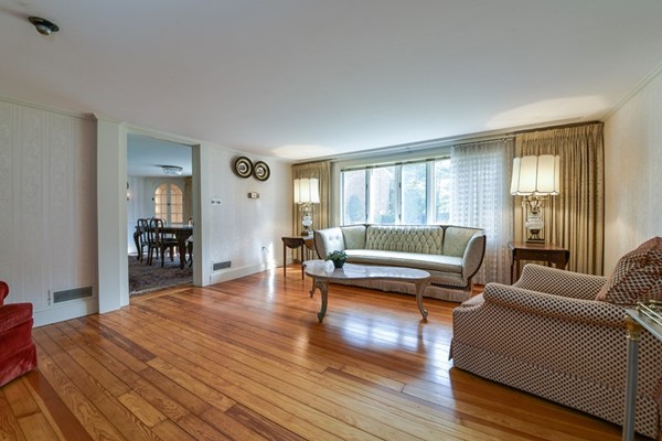 33 R Cedar Street Wellesley, MA 02481 - Photo 3 of 21 a living room with furniture and a large window