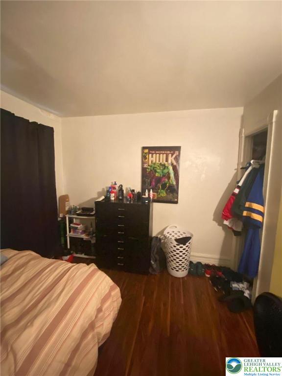 956 West Maple Street Allentown, PA 18102 - Photo 14 of 22 a bedroom with a bed and a dresser