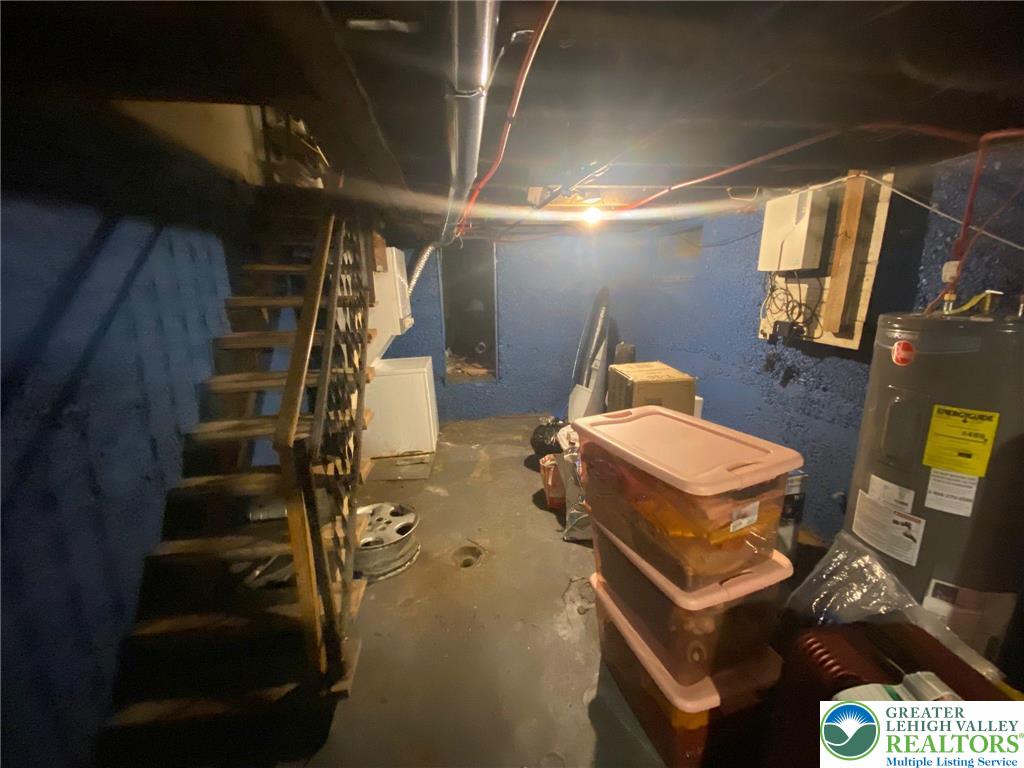 956 West Maple Street Allentown, PA 18102 - Photo 21 of 22 a bedroom with a bed and wooden floor