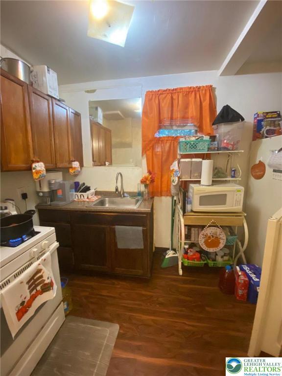 956 West Maple Street Allentown, PA 18102 - Photo 6 of 22 a kitchen with stainless steel appliances a stove a sink and cabinets
