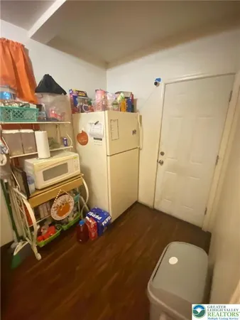 a view of a storage & utility room with washer and dryer