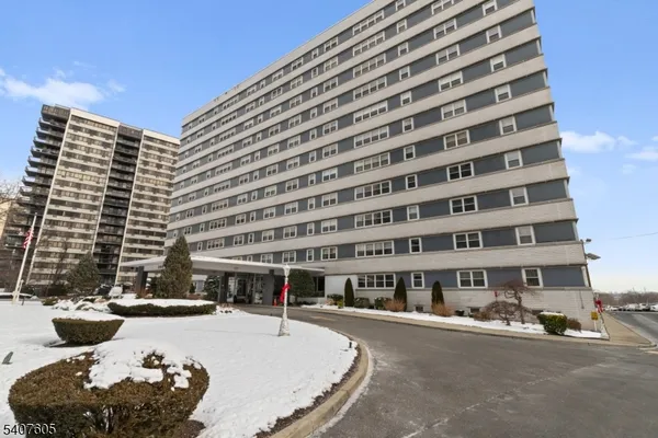 a front view of a building with street view