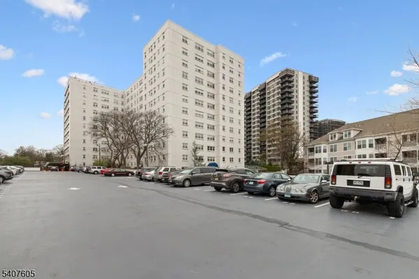 a cars parked in front of a building