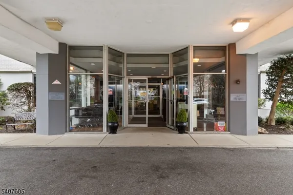 a view of a room with wooden walls