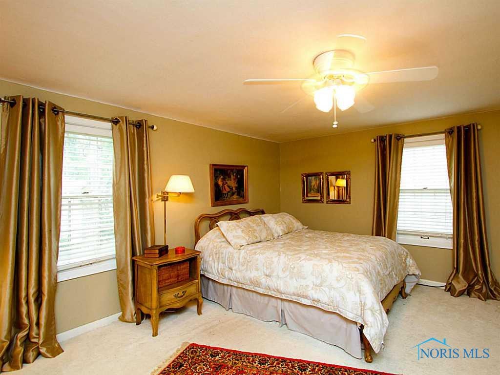 3835 Elmhurst Road Toledo, OH 43613 - Photo 13 of 20 Master Bedroom. Huge master bedroom with 2 walk-in closets and a ceiling fan.